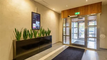 Kontor med hög takhöjd, gym och lunchrestaurang